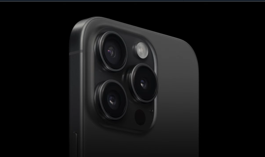 A sleek iPhone 15 Pro Max showcased against a stark black background.