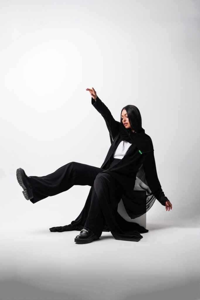 Fashion Photoshoot in Dubai: Model Stuns in Traditional Abaya.