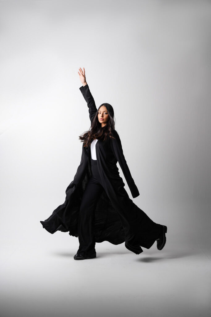 Dubai Studio Photoshoot: Model Presents Abaya Elegance.