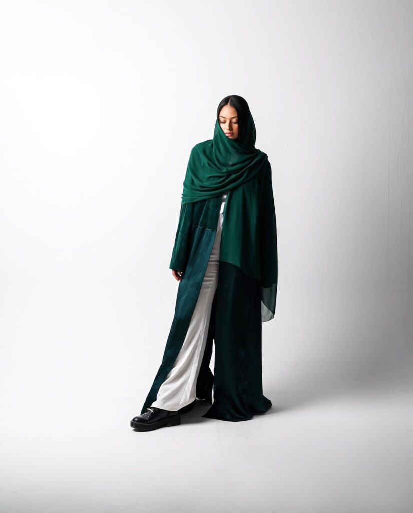 Studio Photoshoot: Model in Green Abaya on White Background - iVantage Photography