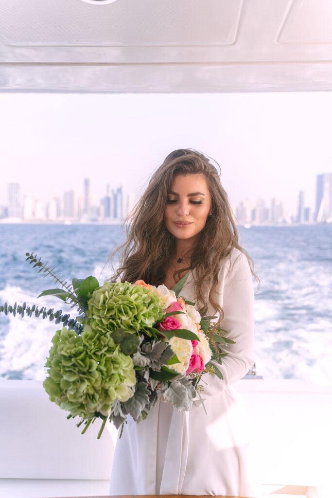 Girl Holding Bouquet on Yacht
