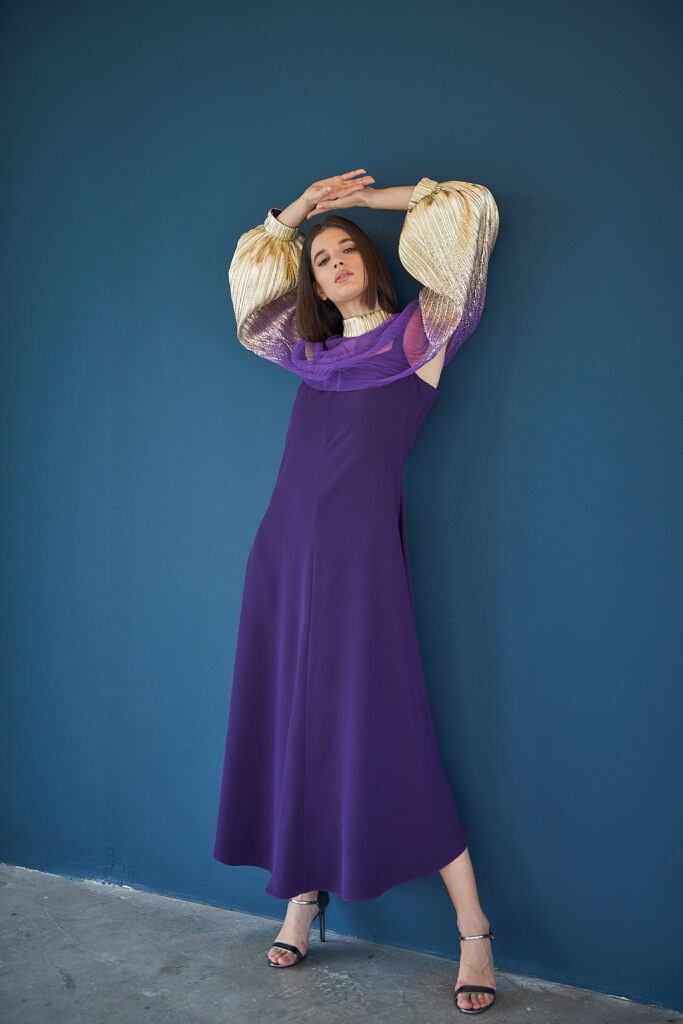 Model showcasing violet designer dress Designer Photoshoot