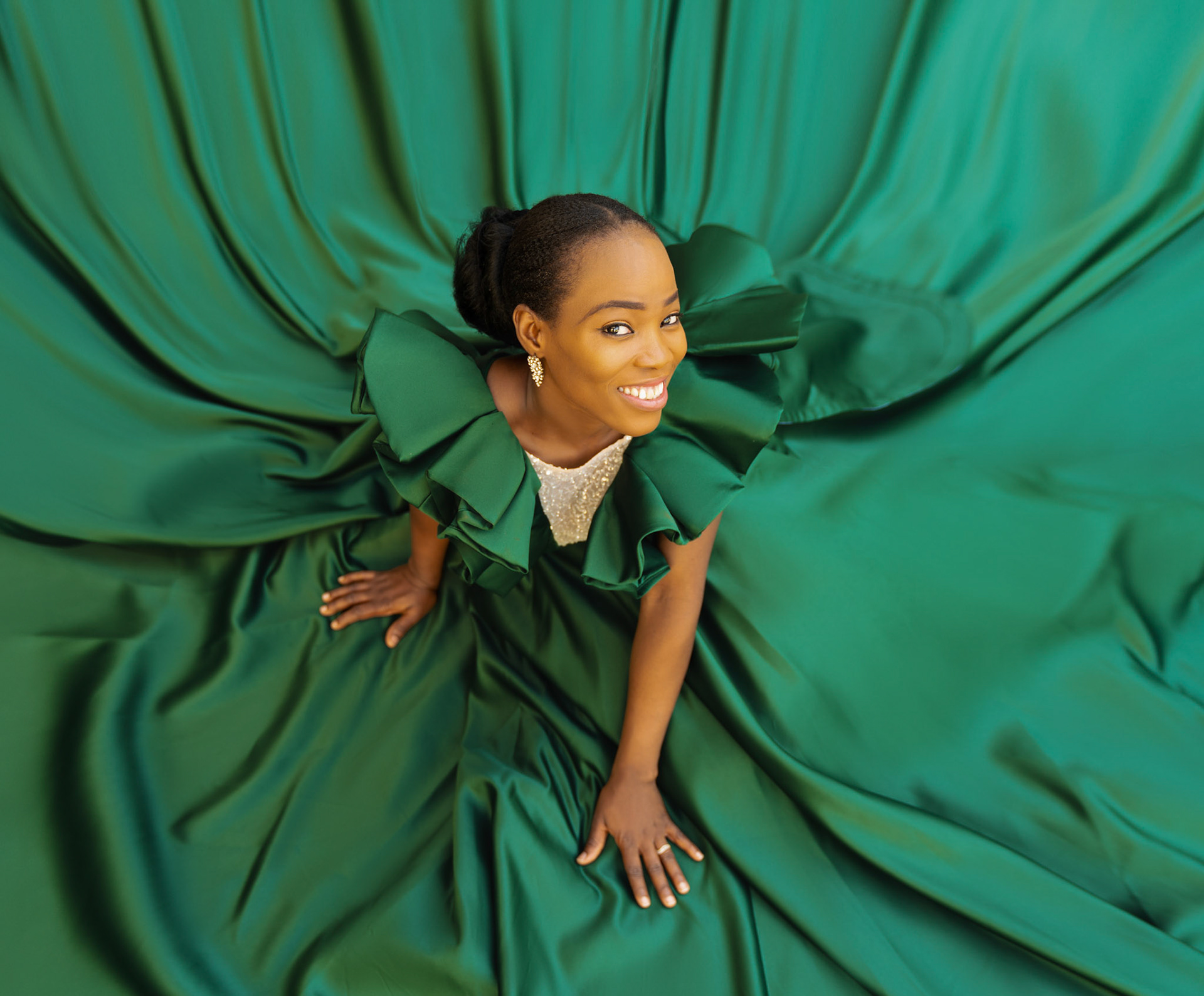 Top View of Woman in Flowing Green Dress by Ivan Cherkashin