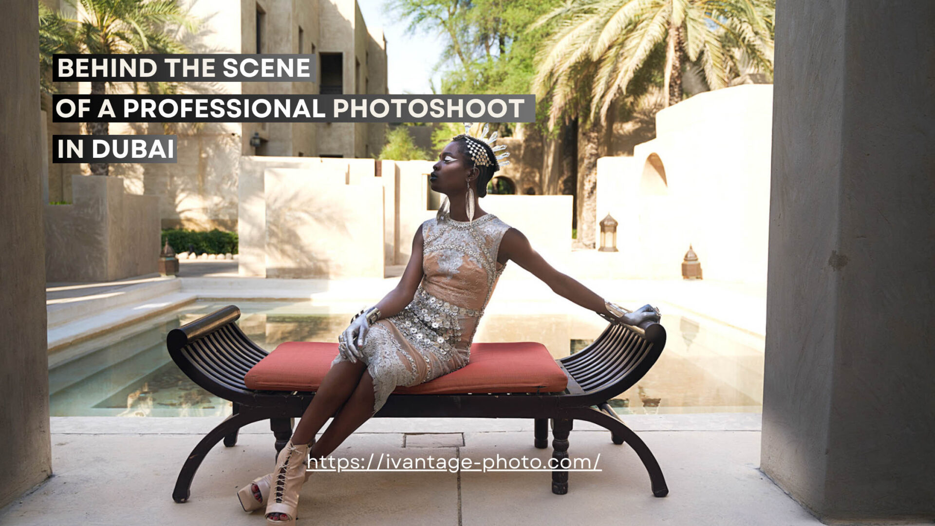 A woman gracefully seated on a wooden bench near a serene pool, surrounded by elements of African heritage and shimmering metallic accents. Professional Photo shoot in Dubai